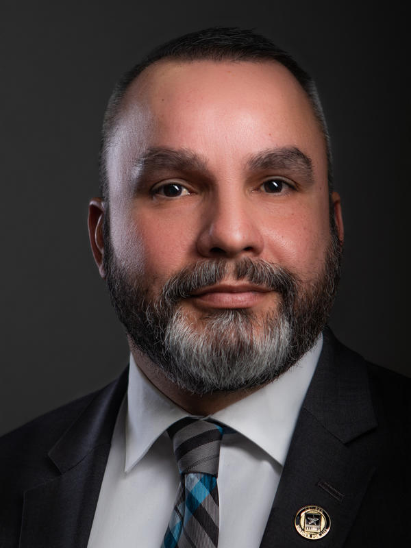 headshot of Carlos Rodriguez